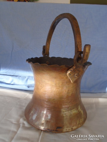 Old copper kettle, pot with cast iron handles
