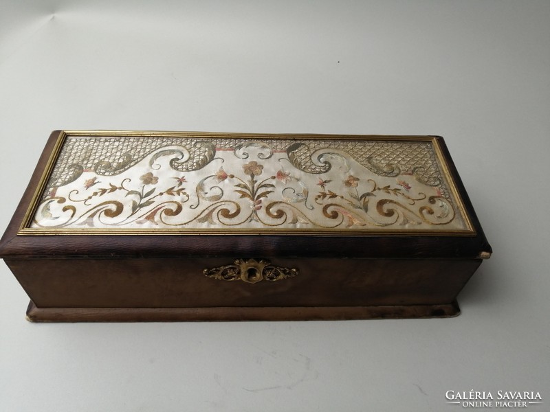 Glove box with embroidery