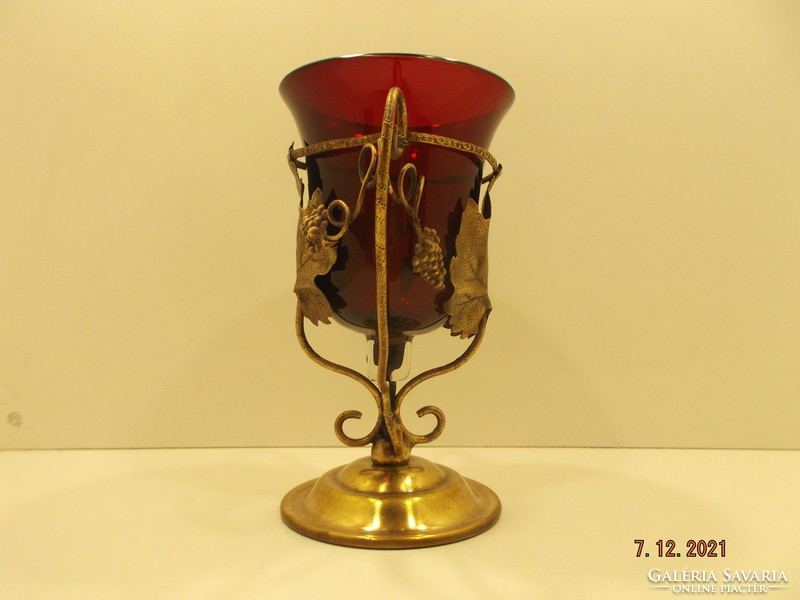 Old copper holder with glass insert. Ornament glass, chalice