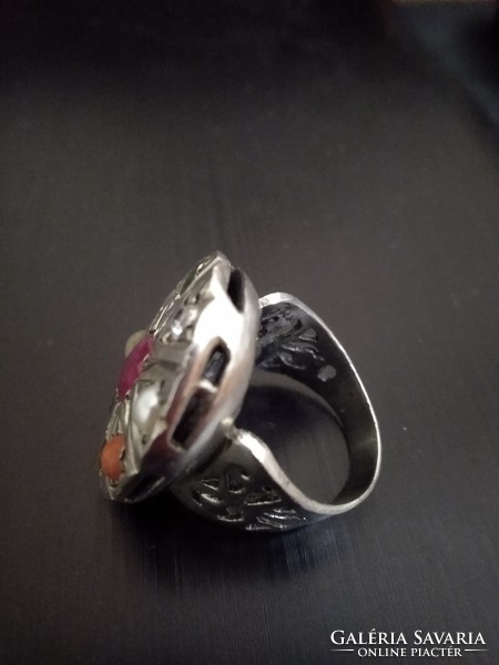 Silver ring with precious stones