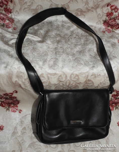 Vintage black leather handbag with built-in mirror