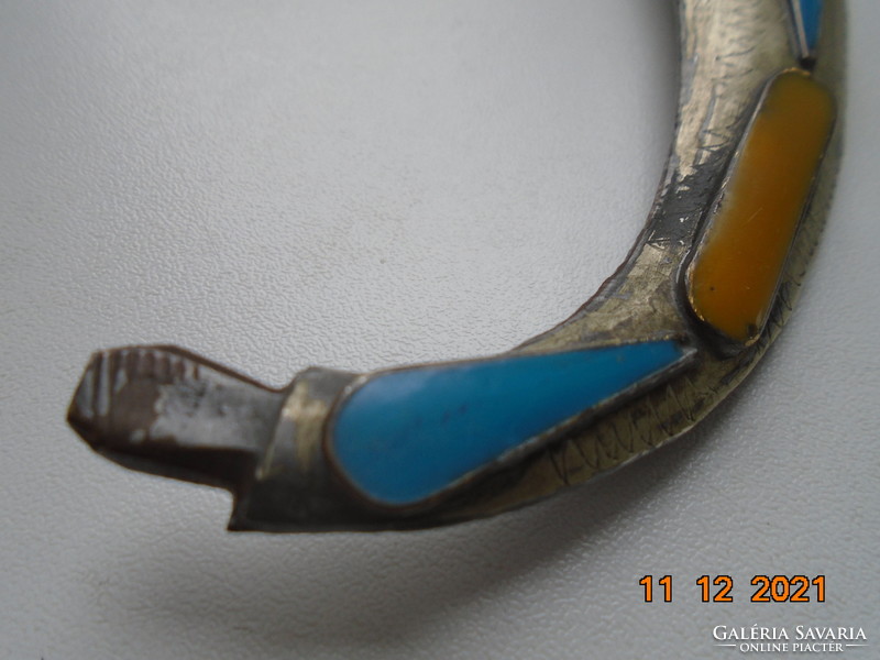 Moroccan Berber marked steel dagger with fire enamel decoration and amber handle