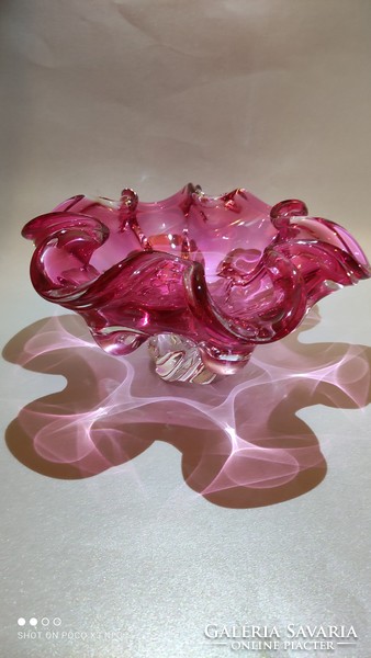 Offering curled glass with heavy ruffled mouth