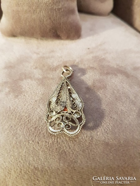 Filigree silver pendant with coral
