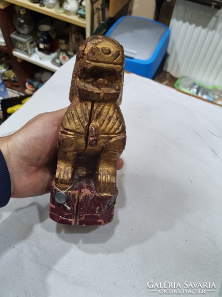 Old oriental wood carved figurine
