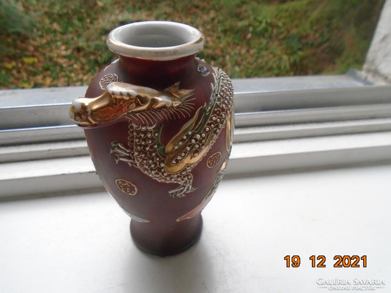 Satsuma moriage hand painted vase with plastic dragon, cannon and rakan pattern