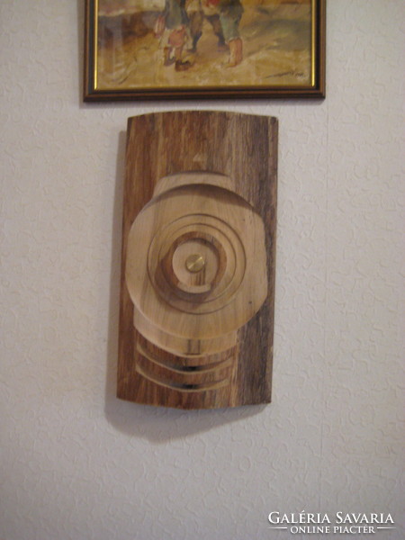 Turned, unique, turned industrial art wall decoration made of oak, with brass eyes