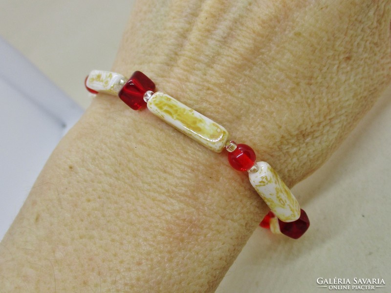 Beautiful bracelet with pearls and red stones
