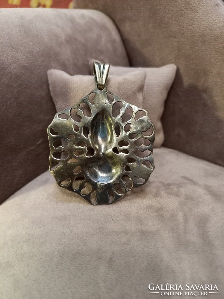 Silver pendant with Thai buddha depiction
