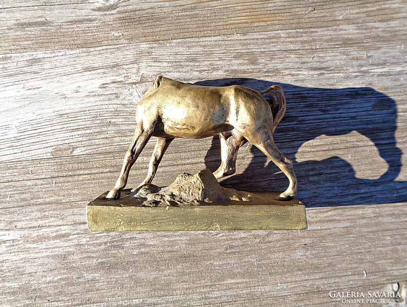 Horse patterned bronze statue
