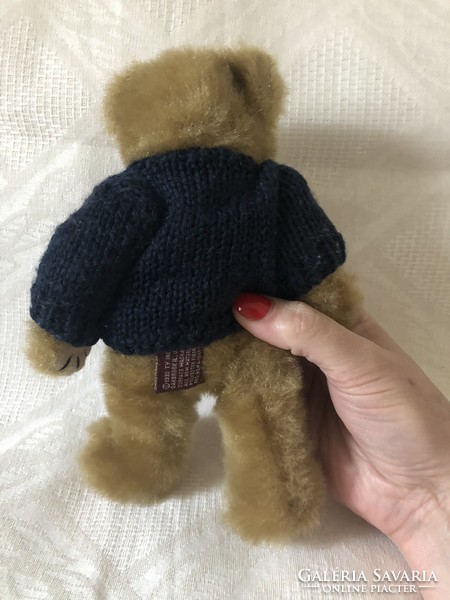 Medium-sized teddy bear boy with teddy bear