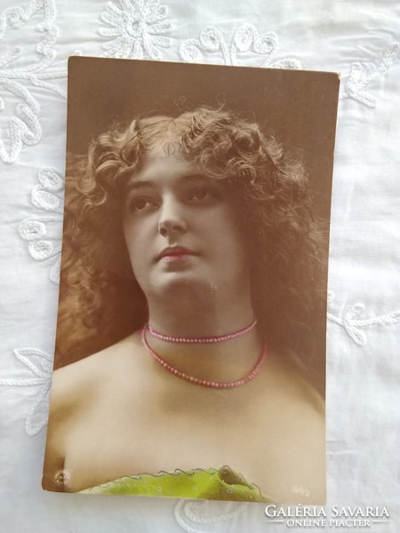 Portrait of antique hand-colored photo / postcard, lady with wavy hair 1910s