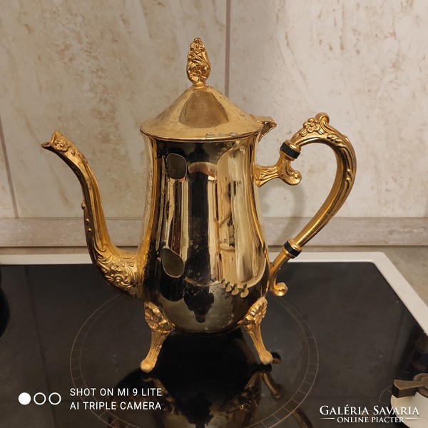 Beautiful gilded neo-baroque style coffee or tea pot