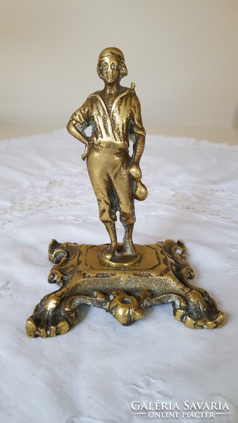 Copper statue on a pedestal