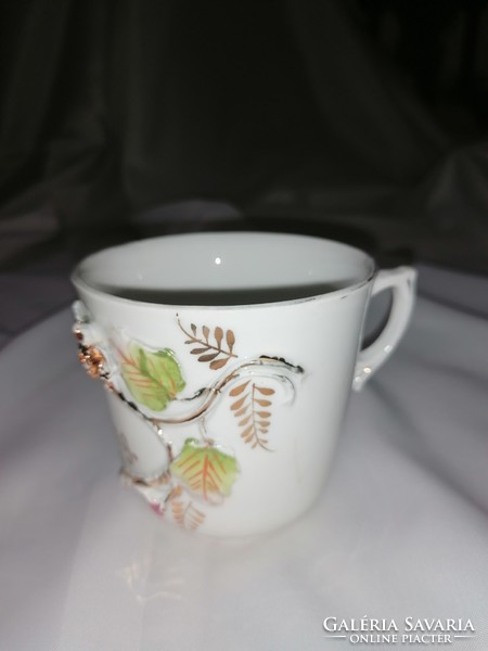 Antique commemorative cup from the early 1900s with a plastic flower ornament