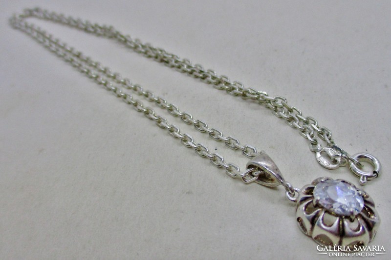 Beautiful silver necklace with antique socket and white stone pendant