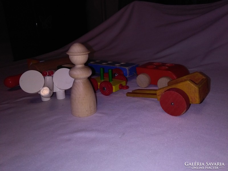 Retro wooden toys together - elephant, cars, stretcher, ...