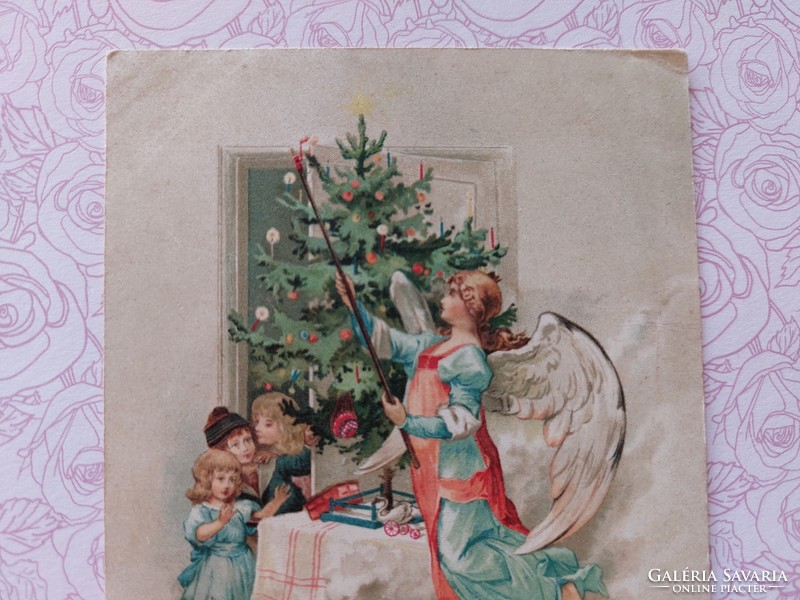 Old Christmas postcard 1898 postcard with angel kids toys