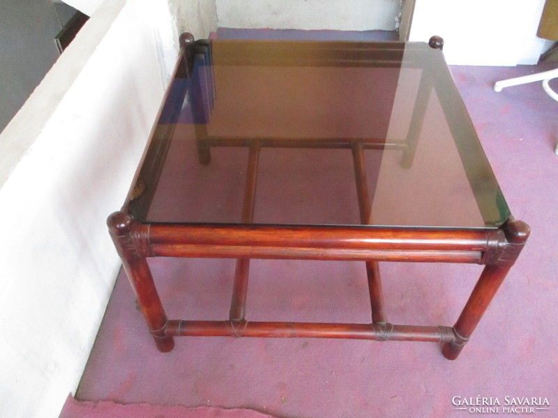 Very nice reed table with smoky glass top, solid, strong table