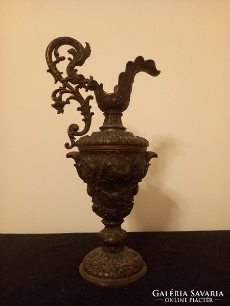 Baroque decorative jug made of copper alloy with angels