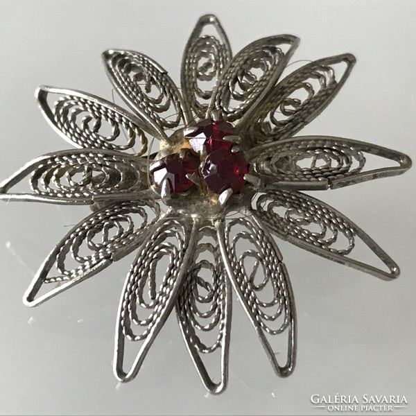 Old filigree silver-plated brooch with garnet stones, 3.5 cm in diameter