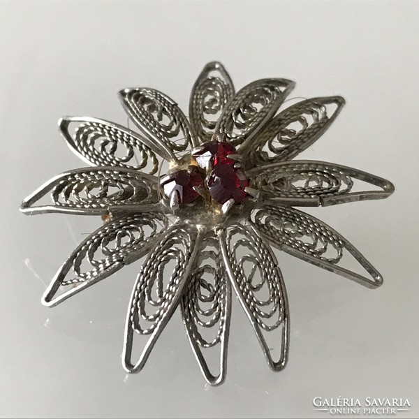 Old filigree silver-plated brooch with garnet stones, 3.5 cm in diameter