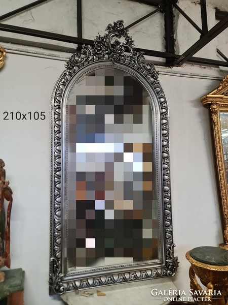 Large silver baroque style mirror
