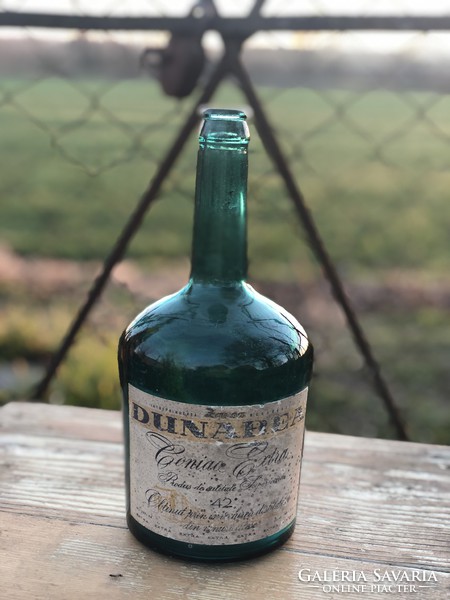 Dunarea labeled blue cognac bottle