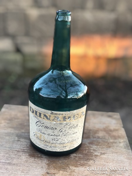Dunarea labeled blue cognac bottle