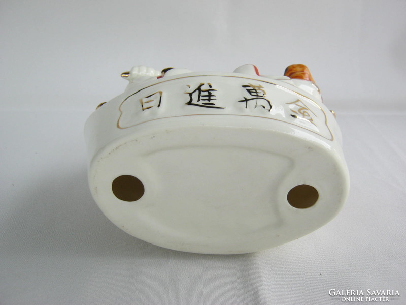 Japanese porcelain lucky figure
