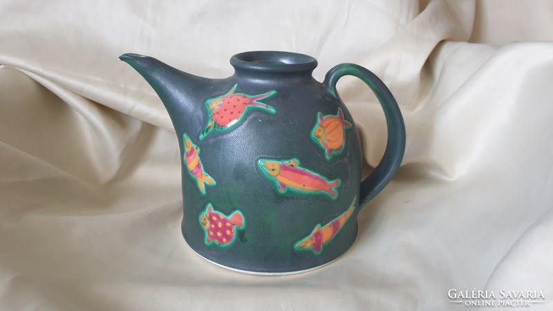 Teapot pouring into Rita's curve mug