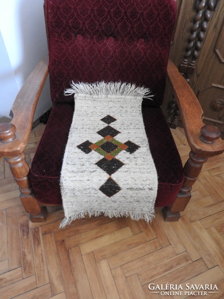 Retro geometric pattern with fringed carpet