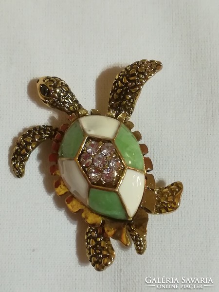 Turtle brooch.