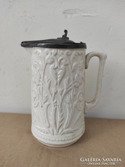 Antique kitchen utensil in white porcelain jug with tin lid 5017