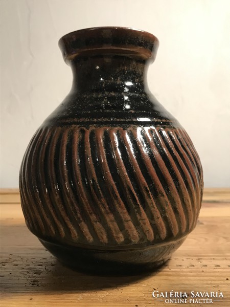 Marked small vase-dark colored vase t-144