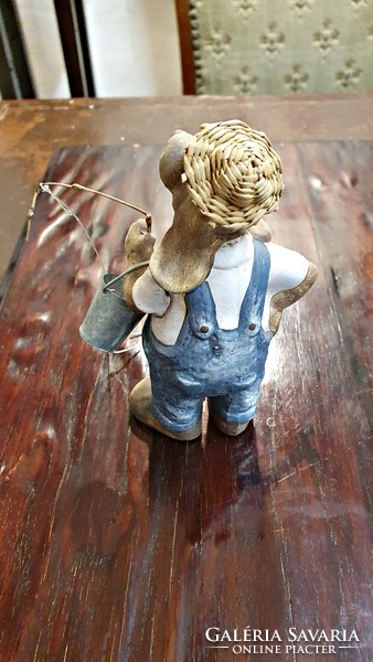 Decor figure. Big-eared fishing dog. In a straw hat, with a fishing rod and a bucket. 13 cm High.