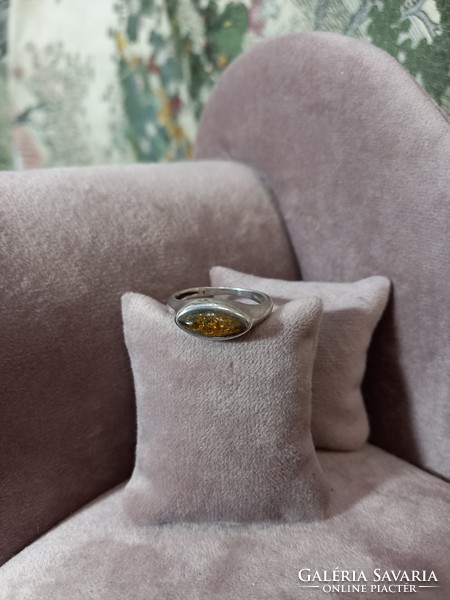 Silver ring with green amber