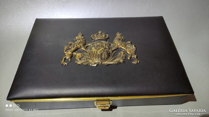 Lined box with copper coat of arms