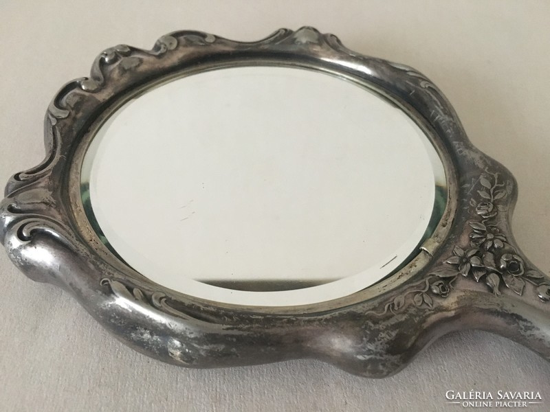 Antique silver plated hand mirror and hairbrush with putties