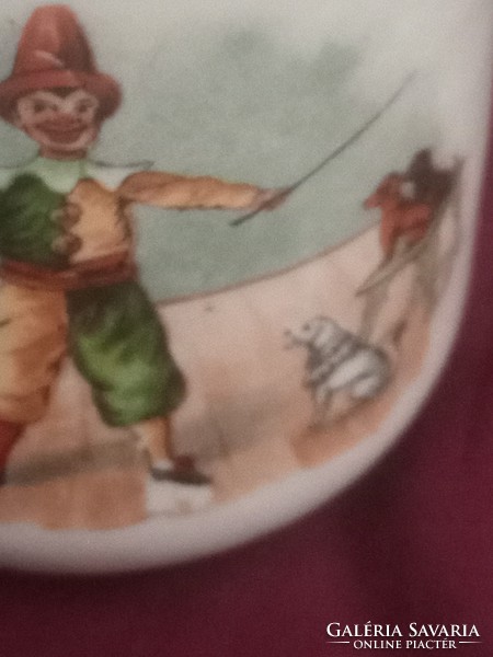 Fairy clown antique porcelain children's cup