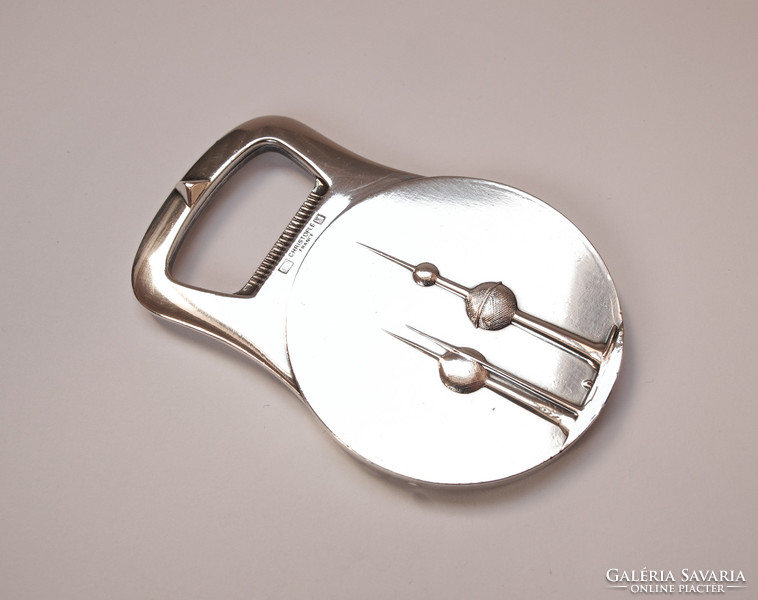 Christofle silver-plated bottle opener.