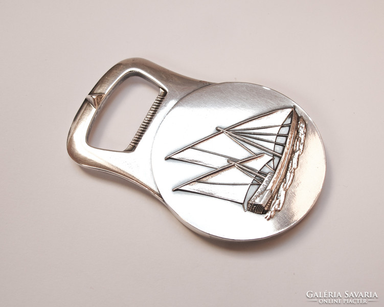 Christofle silver-plated bottle opener.