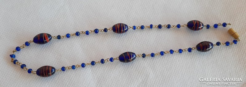 Row of vintage gilded Czech glass beads