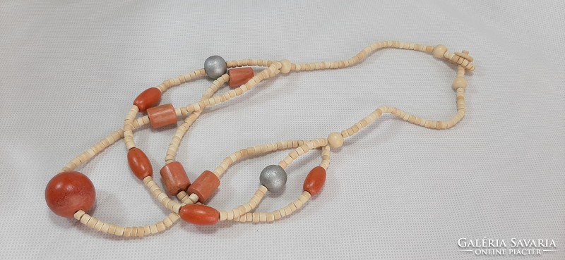 Row of vintage tinted wooden beads