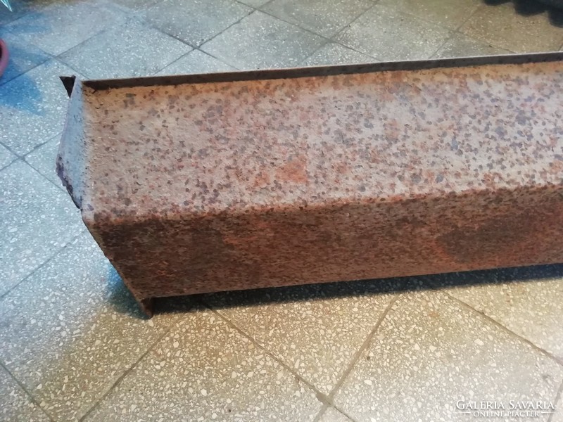 Old small iron drinking trough, decorative object