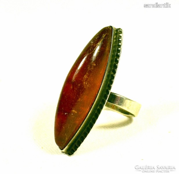 Very spectacular, decorative, slightly patinated, 800 silver ring with large amber.