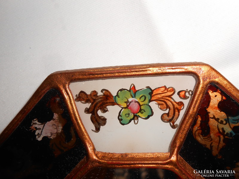 Chinese octagonal small wall mirror.