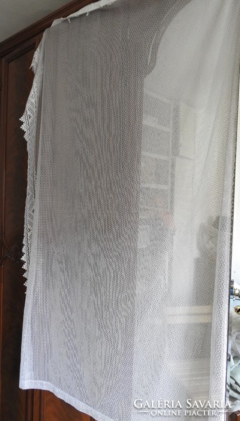 Large lace curtain with ruffles on both edges