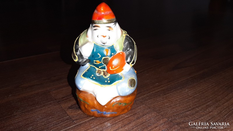 Oriental porcelain figurine