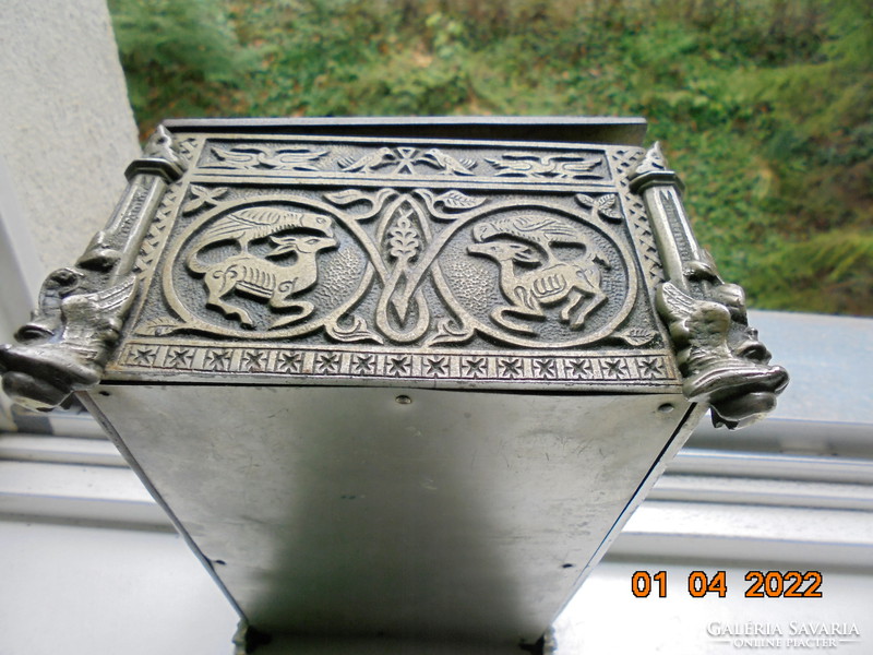 Wrought iron box with rosewood lining with gothic relief with animal patterns and winged faun head columns